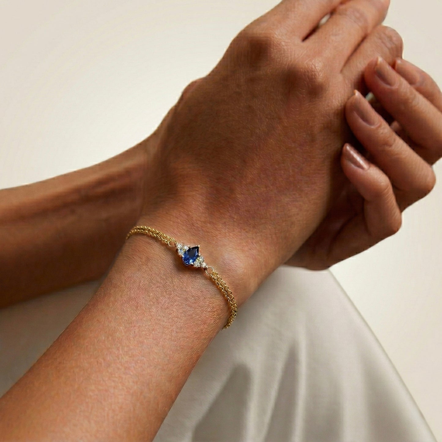 double forza chain with pear-shaped sapphire and diamonds