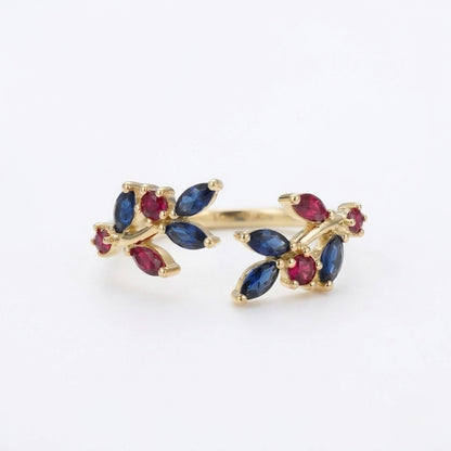 Open bloomed ring with sapphire and ruby stones