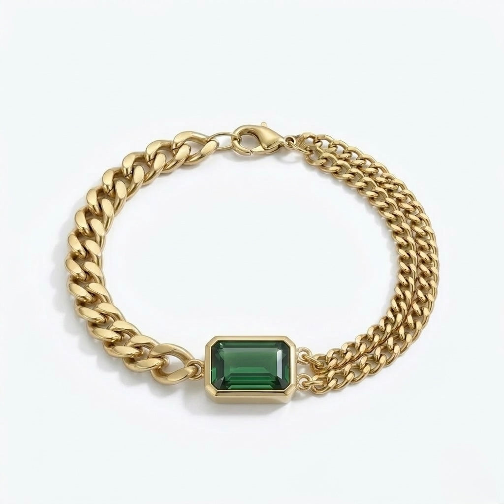 Curb chain bracelet with emerald-cut Emerald