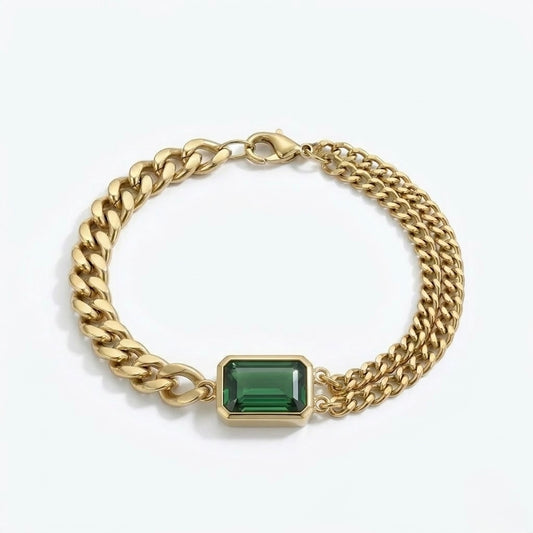 Curb chain bracelet with emerald-cut Emerald