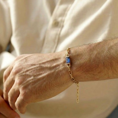 Baguette-cut sapphire with rope chain